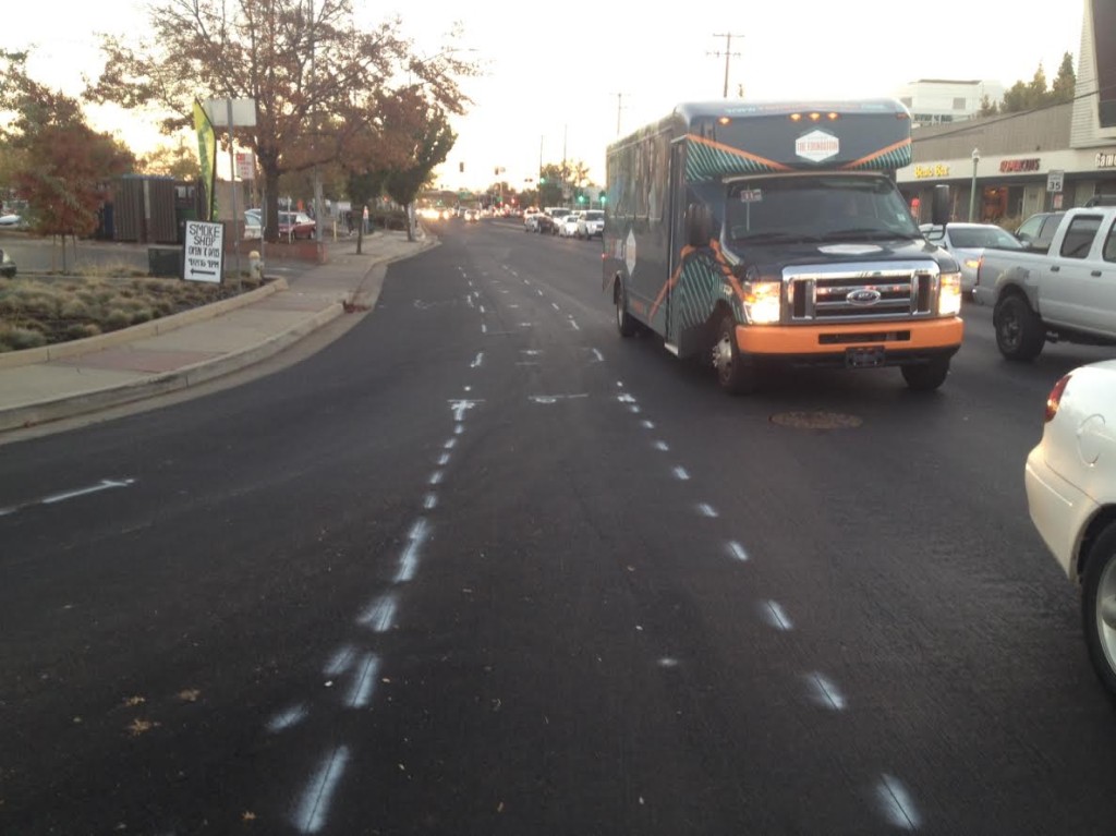 Bike lane striping being added on 65th St. near Folsom Blvd. after repaving