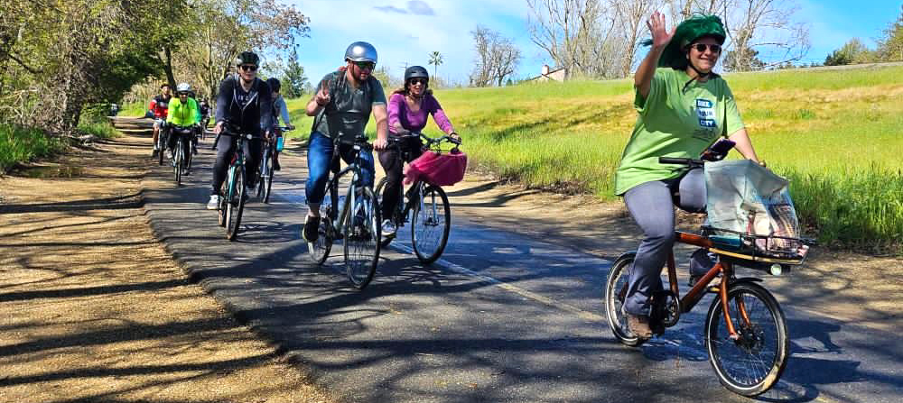 Cyclists ride on the Sacramento river trail.