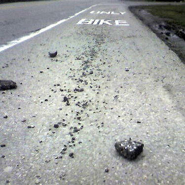 Rocks in the bike lane.